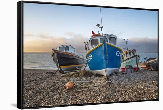 Fishing boats pulled up on shingle beach at sunrise, Beer, Jurassic Coast, Devon, England-Stuart Black-Framed Stretched Canvas