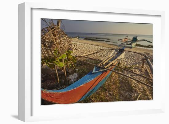 Fishing boats pulled up onto Paliton beach, Siquijor, Philippines, Southeast Asia, Asia-Nigel Hicks-Framed Photographic Print