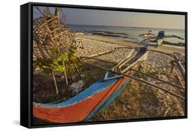 Fishing boats pulled up onto Paliton beach, Siquijor, Philippines, Southeast Asia, Asia-Nigel Hicks-Framed Stretched Canvas