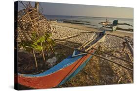 Fishing boats pulled up onto Paliton beach, Siquijor, Philippines, Southeast Asia, Asia-Nigel Hicks-Stretched Canvas