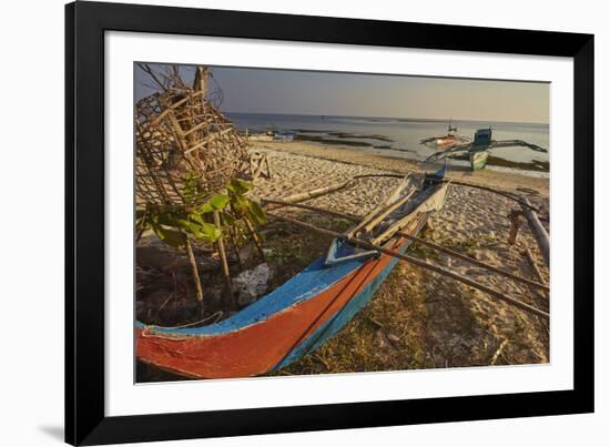 Fishing boats pulled up onto Paliton beach, Siquijor, Philippines, Southeast Asia, Asia-Nigel Hicks-Framed Photographic Print