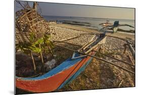 Fishing boats pulled up onto Paliton beach, Siquijor, Philippines, Southeast Asia, Asia-Nigel Hicks-Mounted Photographic Print