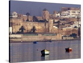 Fishing Boats with 17th century Kasbah des Oudaias, Morocco-Merrill Images-Stretched Canvas