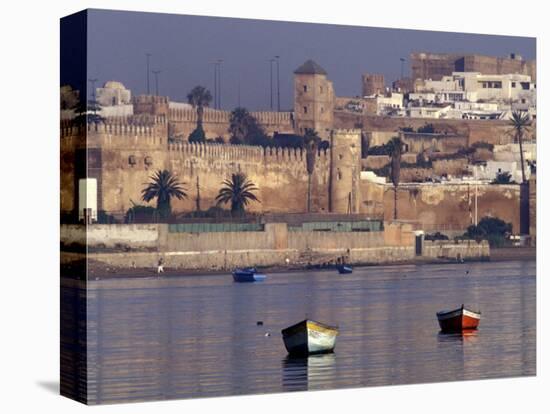 Fishing Boats with 17th century Kasbah des Oudaias, Morocco-Merrill Images-Stretched Canvas
