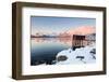 Fishing Hut on Stilts on a Pier, Winter Landscape in a Fjord in Front of Snowy Mountains-P. Kaczynski-Framed Photographic Print