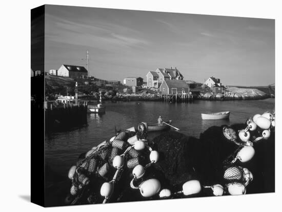Fishing Nets and Houses at Harbor, Peggy's Cove, Nova Scotia, Canada-Greg Probst-Stretched Canvas