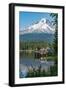 Fishing on Trillium Lake with Mount Hood, part of the Cascade Range, reflected in the still waters,-Martin Child-Framed Photographic Print