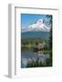 Fishing on Trillium Lake with Mount Hood, part of the Cascade Range, reflected in the still waters,-Martin Child-Framed Photographic Print