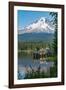 Fishing on Trillium Lake with Mount Hood, part of the Cascade Range, reflected in the still waters,-Martin Child-Framed Photographic Print