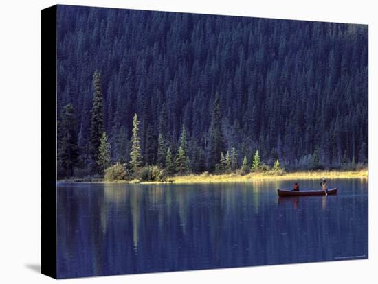 Fishing on Waterfowl Lake, Banff National Park, Canada-Janis Miglavs-Stretched Canvas