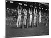 Five Male Maryland Cheerleaders Jumping-null-Mounted Photographic Print