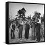 Five Male Musicians Dressed in Hats and Bib Overalls Standing in a Field-Eric Schaal-Framed Stretched Canvas