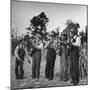 Five Male Musicians Dressed in Hats and Bib Overalls Standing in a Field-Eric Schaal-Mounted Photographic Print