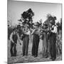 Five Male Musicians Dressed in Hats and Bib Overalls Standing in a Field-Eric Schaal-Mounted Photographic Print