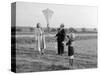 Five Year Old Boy with Mother and Father Fly a Kite, Ca. 1951-null-Stretched Canvas