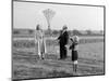 Five Year Old Boy with Mother and Father Fly a Kite, Ca. 1951-null-Mounted Photographic Print