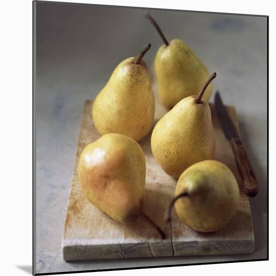 Five Yellow Pears on a Chopping Board-Michael Paul-Mounted Photographic Print