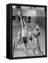 Five Young Boys Wearing Gym Clothes and Playing a Game of Basketball in the School Gym-null-Framed Stretched Canvas