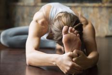 Close up of Young Woman Practicing Yoga, Sitting in Head to Knee Forward Bend Exercise, Janu Sirsas-fizkes-Photographic Print