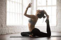 Close up of Young Woman Practicing Yoga, Sitting in Head to Knee Forward Bend Exercise, Janu Sirsas-fizkes-Laminated Photographic Print