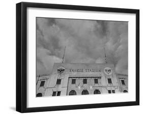 Flags Flying at Half Mast on Top of Yankee Stadium to Honor Late Baseball Player Babe Ruth-Cornell Capa-Framed Photographic Print