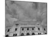 Flags Flying at Half Mast on Top of Yankee Stadium to Honor Late Baseball Player Babe Ruth-Cornell Capa-Mounted Photographic Print