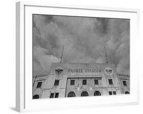 Flags Flying at Half Mast on Top of Yankee Stadium to Honor Late Baseball Player Babe Ruth-Cornell Capa-Framed Photographic Print