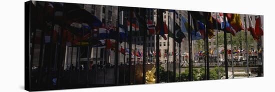 Flags in a Row, Rockefeller Plaza, Manhattan, New York, USA-null-Stretched Canvas