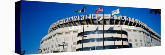 Flags in Front of a Stadium, Yankee Stadium, New York City, New York, USA-null-Stretched Canvas