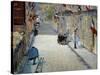 Flags in Mosnier Street-Edouard Manet-Stretched Canvas