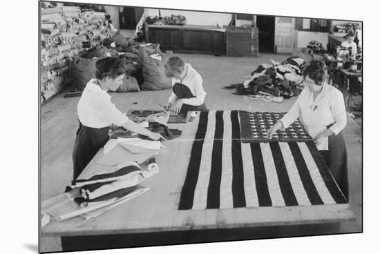 Flags Laid Out on Cutting Table to Be Sewn by Seamstresses During the Period of the Great War-null-Mounted Premium Giclee Print