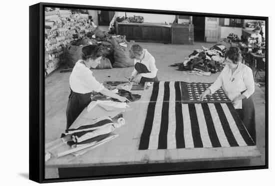 Flags Laid Out on Cutting Table to Be Sewn by Seamstresses During the Period of the Great War-null-Framed Stretched Canvas