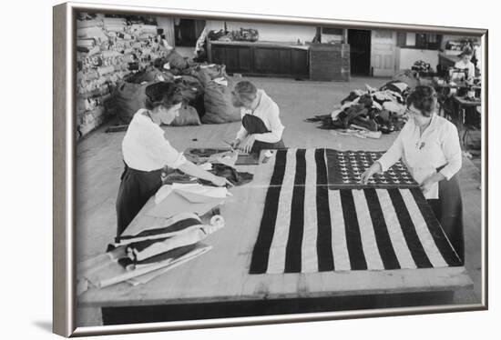 Flags Laid Out on Cutting Table to Be Sewn by Seamstresses During the Period of the Great War-null-Framed Art Print