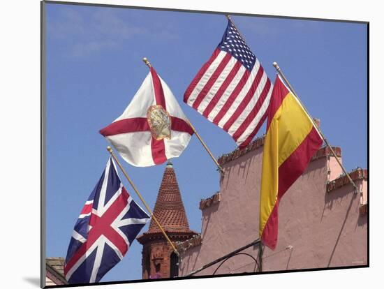 Flags of Great Britain, Florida, U.S., and Spain Fly in the Historic Distict of Saint Augustine-null-Mounted Photographic Print
