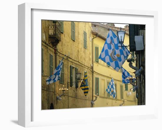 Flags of the Onda (Wave) Contrada in the Via Giovanni Dupre, Siena, Tuscany, Italy, Europe-Ruth Tomlinson-Framed Photographic Print