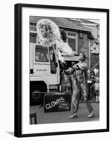 Flame-Throwing Clown-null-Framed Photographic Print