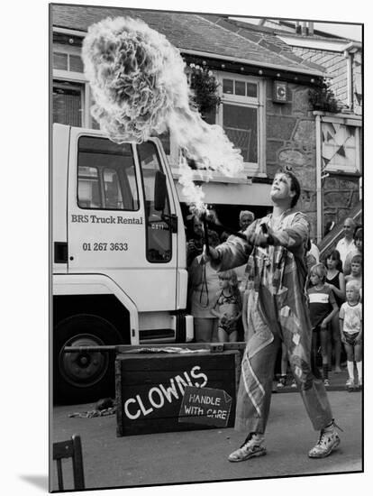 Flame-Throwing Clown-null-Mounted Photographic Print