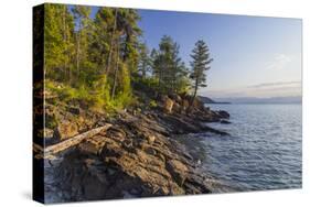 Flathead Lake, Sunrise Light at West Shore State Park Near Lakeside, Montana, USA-Chuck Haney-Stretched Canvas