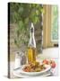 Flavored Oil and Salt and Pepper Shakers Beside Bowl of Pasta-null-Stretched Canvas