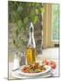 Flavored Oil and Salt and Pepper Shakers Beside Bowl of Pasta-null-Mounted Photographic Print