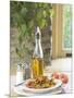 Flavored Oil and Salt and Pepper Shakers Beside Bowl of Pasta-null-Mounted Photographic Print