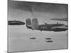 Flight of American B-25 Mitchell Bombers Enroute to a Bombing Mission over the Port of Madang-null-Mounted Photographic Print