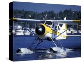 Float Plane Taxiing to Terminal on Lake Union, Washington, USA-William Sutton-Stretched Canvas