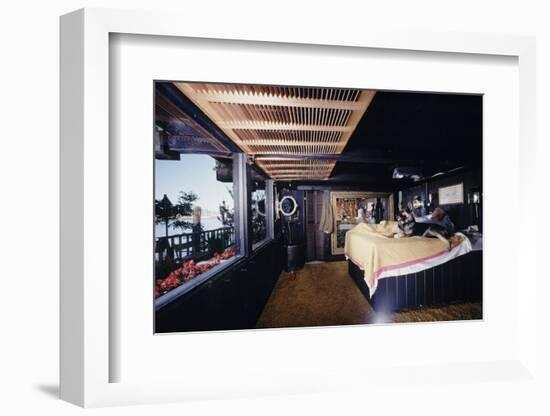 Floating-Home Owner Warren Owen Fonslor in His Bedroom, Sausalito, CA, 1971-Michael Rougier-Framed Photographic Print