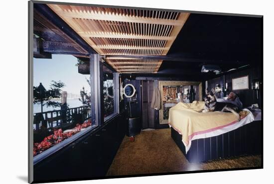 Floating-Home Owner Warren Owen Fonslor in His Bedroom, Sausalito, CA, 1971-Michael Rougier-Mounted Photographic Print