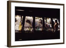 Floating-Home Owner Warren Owen Fonslor Watering the Hanging Plants, Sausalito, CA, 1971-Michael Rougier-Framed Photographic Print