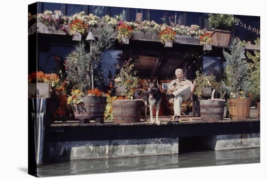 Floating-Home Owner Warren Owen Fonslor with His German Shepherd, Sausalito, CA, 1971-Michael Rougier-Stretched Canvas