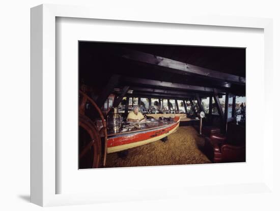 Floating-Home Owner Warren Owen Fonslor Works at a Desk in His Office, Sausalito, CA, 1971-Michael Rougier-Framed Photographic Print