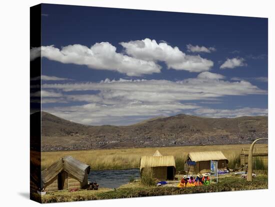 Floating Islands of Uros People, Traditional Reed Boats and Reed Houses, Lake Titicaca, Peru-Simon Montgomery-Stretched Canvas