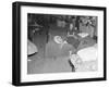 Flood refugees in a factory used by the Red Cross as a relief station in Mayfield, Kentucky, 1937-Walker Evans-Framed Photographic Print